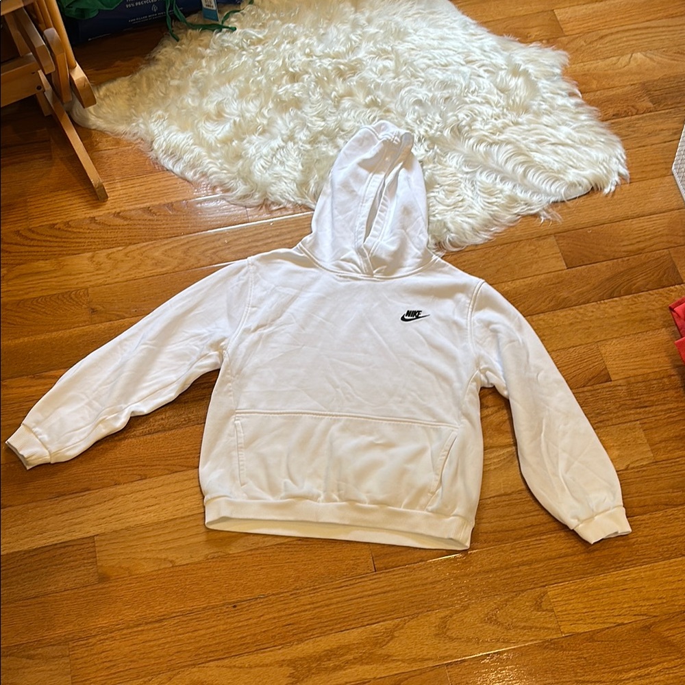 White Nike hoodie.